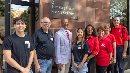 On hand during move-in day were: Jerry Deblois (left), an Honors College lead community mentor; Honors College Dean J.D. Bowers; Rutgers President William F. Tate IV; Alina Chen, an Honors College lead ambassador; Rutgers-New Brunswick Chancellor Francine Conway; Francesca Maresca, Interim Vice Chancellor for the Student Experience; Carolyn Moehling, Senior Vice Provost and Vice Chancellor for Undergraduate Education; and Charles Keeton, Vice Provost for Experiential Learning.