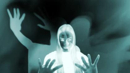 A scene from "Anima Magia," a 10-minute short film by Rutgers cinema studies lecturer Al Nigrin, depicts a negative image of a woman.